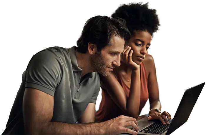 Couple reviewing their move estimate on a laptop